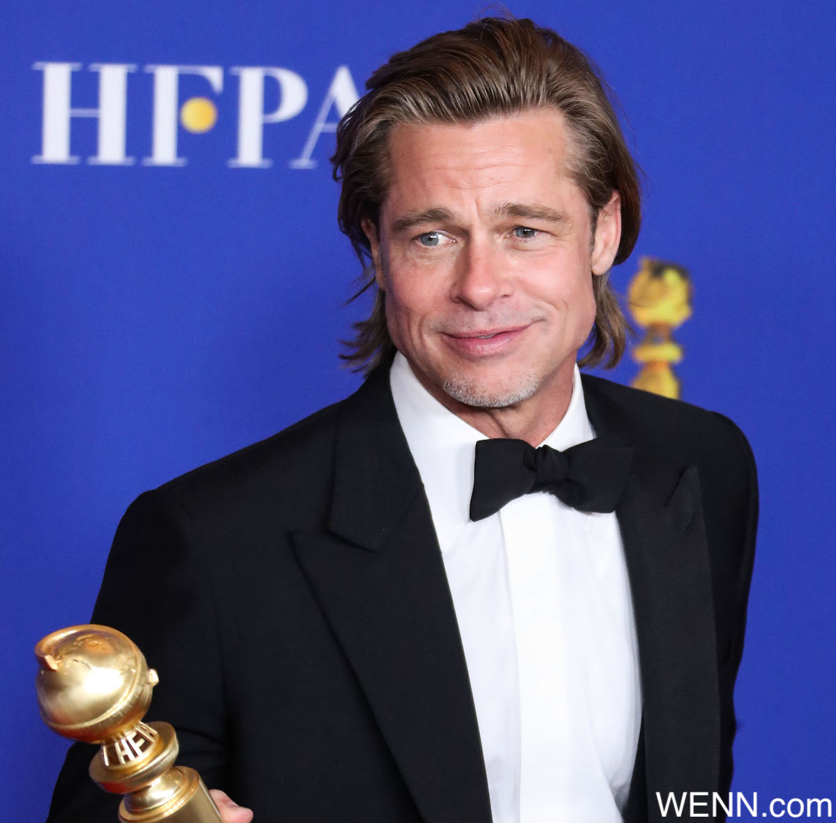 Actor Brad Pitt wearing a Brioni tux poses in the press room at the 77th Annual Golden Globe Awards held at The Beverly Hilton Hotel on January 5, 2020 in Beverly Hills, Los Angeles, California, United States. Where: Beverly Hills, California, United States When: 05 Jan 2020 Credit: WENN/Avalon **WENN/Avalon**