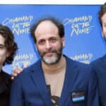 左からティモシー・シャラメ、ルカ・グァダニーノ監督、アーミー・ハマー Photo: Maria Laura Antonelli/Shutterstock