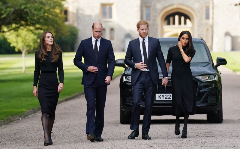 左からキャサリン妃、ウィリアム皇太子、ヘンリー王子、メーガン妃 Photo: Kirsty O'Connor/WPA Pool/Shutterstock